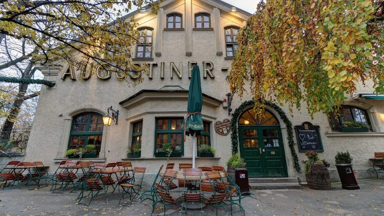 Image of a German Restaurant with tables on the front patio